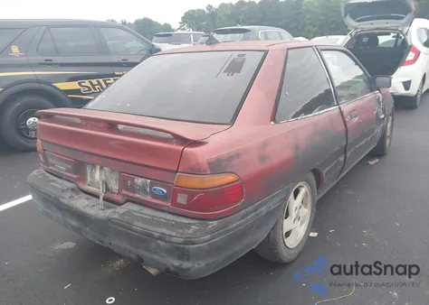 1993 Ford Escort из США, поврежденный, VIN 1FAPP10J7PW296639